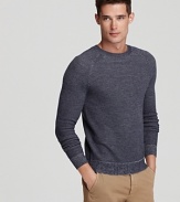 Warm up to cooler weather in this superior crewneck sweater from Theory, perfect with jeans or casual pants on a breezy afternoon.