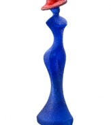 Ready for her closeup, the Madame Blue figurine from Kosta Boda is a vision of chic femininity. A textured surface is created with heated glass powder for added interest. Designed by Kjell Engman.