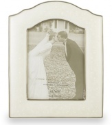 Capture your most magical moment in this medium sized, porcelain frame.  Scalloped edges and a luminous finish combine for a truly elegant effect. Qualifies for Rebate
