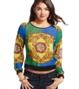 Designed for the girl whose fashion philosophy mixes bold style with trend-right details, this top from XOXO features a chic back cutout and totally dynamic scarf print!
