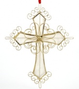 A traditional symbol of the season, this cross ornament gives a sweet shine to your tree with a lustrous Capiz shell base and gold frame. With red ribbon handing thread.