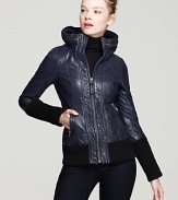 Biker-chic to get your haute racing, this Mackage jacket features a wide, round stand collar with a zip-out hood and is finished with extra-long ribbed cuffs and hem.