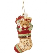 Get one step ahead with the Bountiful Holiday stocking ornament from Fitz and Floyd. Rich with detail, from the quilted texture in its toe to the classic teddy bear inside, it will remind you always of a beautiful 2012 season.