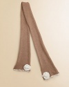 A classic neck warmer with lots of charm, trimmed with contrast rosettes and scallop edges.Long knit style with rosettes at the endsContrast scallop edgingPolyester/nylon/wool/angora/cashmereDry cleanImported
