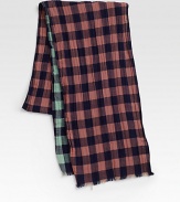 Soft, double-faced crinkle cotton offers two distinctive colorways to compliment your wardrobe.Fringed ends8W X 70LCottonImported
