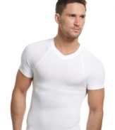 Seamless and snug for full no-show coverage, this form-fitting tee from One Flat Jack does all the work under your shirt for a sleek, slimmed down effect.