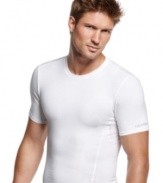 Comfortable enough to wear every day, this slimming compression t shirt from Calvin Klein visibly flattens your midsection for a sleek silhouette.