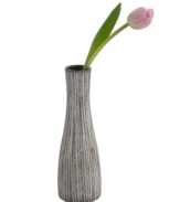 Vertical lines, muted colors and a sleek silhouette in simple ceramic give the Design Ideas Fiji vase a sense of understated cool.