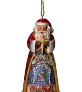 Recap the real story of Christmas with someone who carries its message around the world. Santa gives it his all, clasping the Star of Bethlehem and watching over the holy family in traditional Jim Shore style.