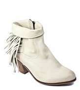 Frisky fringe lends Western flair to Sam Edelman's Louie booties, in vintage-look, distressed leather.