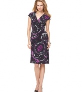 Show off your curves in this faux wrap dress from Elementz. The surplice neckline and ruched side lend feminine appeal to any occasion.