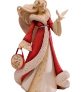 Both peaceful symbols of the season, a dainty dove perches upon the hand of this charming angel figurine dressed in an ornate robe with crystal accents. She bears the sentiment: Peace be with you.