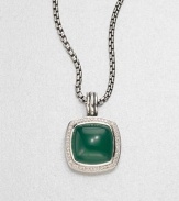From the Albion Collection. A stunning green onyx cabochon surrounded by dazzling diamonds set in sleek sterling silver. Green onyxDiamonds, .46 tcwSterling silverSize, about .7Fixed baleMade in USA Please note: Chain sold separately. 