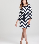 With a nod to the '70s, this Vineyard Vines dress makes a graphic impact with a bold chevron print. An alluring v back lends a chic finish to the retro style.