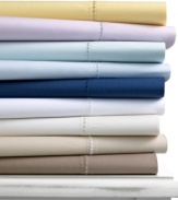 A good night's sleep starts with the pure cotton softness of this Martha Stewart Collection fitted sheet, featuring a smooth 400 thread count.