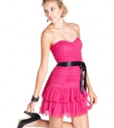 Prom or homecoming will always be memorable in this super-glam strapless dress by Hailey Logan! Fun ruching and ruffles show off your feminine side, while the black ribbon belt adds some edge to your look.