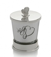 Spark some romance. Loopy hearts accent the silver-plated Love Story candle holder with elegant whimsy, inside and out.