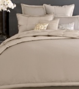 A simple design is transformed into fanciful sophistication with this Modern Classics Platinum Ash duvet cover from Donna Karan, featuring lush texture in a soothing colorway. Finished with silk trim. Button closure.