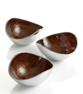 Full of surprises, these handcrafted nut bowls feature sleek, polished aluminum lined with a warm and earthy amber hue. A beautiful set for serving snacks or simply decorating the table. From the Simply Designz collection of serveware and serving dishes.