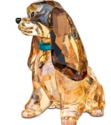 Retell the heartwarming story of Lady and the Tramp in dazzling Swarovksi crystal. Every bit as stunning as Disney's star cocker spaniel, the Lady figurine glistens in shades of gold and topaz with a Indicolite crystal collar.