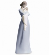There's simply nothing on earth like a mother's embrace. Beautifully evoking the sweet simplicity of this unparalleled experience, this figurine is delicately crafted in fine porcelain with simple painted hues and a high gloss finish. Measures 12.5 x 4.