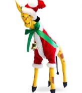 Animals all over the world embrace the season too, like this festively dressed giraffe boasting the soft, flexible features and unmistakable style of Annalee figurines.