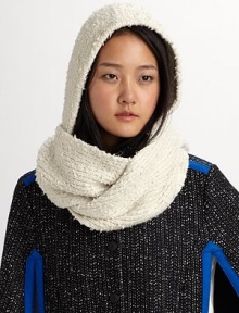 This nubby cotton knit wraps around the head and shoulders as a cozy topper to any outfit.Cotton Dry clean Imported