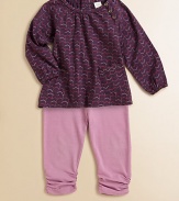 The season's must-have peasant top features front button detail, front patch pockets and a colorful zig-zag print with matching leggings.Round necklineLong sleeves with elastic cuffsBack snapsPatch pockets Leggings Elastic waistbandRuched hemCottonMachine washImported Please note: Number of snaps may vary depending on size ordered. 