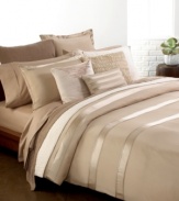 It's all in the details! The Essentials Vapour sham from Donna Karan adds elegance and comfort to your bed with perfectly tailored alternating rows of shiny and matte silk charmeuse.