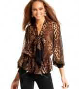 The look of the season, the bow-neck blouse, gets wild with a leopard-printed update from Baby Phat!