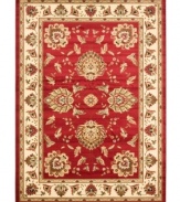 Bring the brilliance of ancient Persian textile design home with this vibrant red Lyndhurst area rug from Safavieh. Crafted from soft polypropylene, this rug radiates timeless allure with the added convenience of easy-care construction. (Clearance)