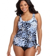 With a cute side tie, this plus size Swim Solutions tankini top is both figure flattering & feminine, complete with a flirty ruffled neckline!