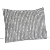 Embroidered lines in shades of white and grey stripe this soft chambray pillow.
