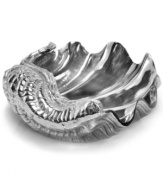 Seafood is always on the menu with the Coquilles grand conch bowl from Star Home. Individually sculpted and finished by hand, it lends whimsical charm to seaside homes.