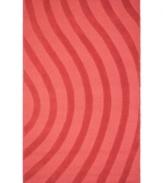 Abstract and absorbing, this rose-colored rug adds movement to any room. Playful, wavy lines reverberate against a warm red ground, resounding with personality in your home.