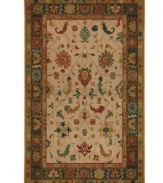 Distinctive coloration distinguishes this Karastan area rug from its classic counterparts, featuring a meticulously styled ground with traditional vine-and-blossom details. Woven from lush nylon that delivers softness underfoot and superb resistance to everyday wear.