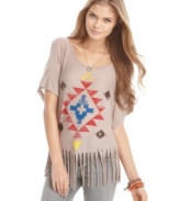 Score that tribal vibe with a casually printed top from Living Doll. Pair it with gray wash denim for a relaxed, daytime look.