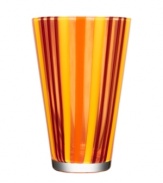 With a retro feel and stripes of fun candy colors, the beach-inspired Cabana vase brightens any space with irresistible style. Designed by Ludvig Lofgren for Kosta Boda.