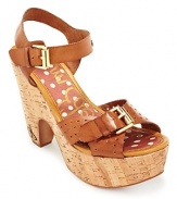 A clog-inspired silhouette in cork from Sam Edelman. Gold-tone buckles and perforated details lend finishing touches.