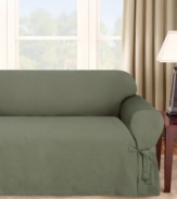 Featuring a narrow pinstripe weave in solid hues, Sure Fit's Logan sofa T-cushion slipcover gives your furniture a bold new look. Subtle textured detail and decorative ties add to this slipcover's classic appeal. One piece.