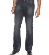 A dark wash and a zip-closure on the side add a modern edge to these relaxed fit jeans from Sean John.