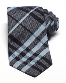 Burberry London preserves its heritage with a sophisticated signature check tie, crafted for a classic look that pairs well dressed up or down.