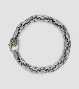 Link-style design in gleaming sterling silver with a signature 18k gold accent clasp. About 8½ long Lobster clasp Made in USA