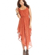 Gold stars light-up this dress in a gorgeous constellation. Designed with a handkerchief hem and layers of chiffon, this floaty number from Pretty Rebellious has the unique style of a rare, vintage find!