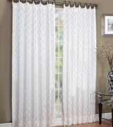 A simple latticework design is made exquisite in combination with a detailed jaquard weave upon this Tuxedo window panel from Regal. Its unique decorative metal grommet tab top makes hanging easy while putting fashion forward.