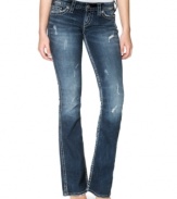 So Twisted: extreme fading and a burst of rips lend rugged-chic style to Silver Jeans' five-pocket bootcut denim.