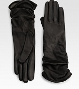 EXCLUSIVELY AT SAKS.COM. Rendered in sumptuous leather with ultra-plush cashmere lining with a ruched silhouette. About 12.5 longCashmere liningDry cleanMade in Italy
