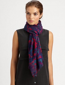 Luxuriously soft wool is blooming with a brilliant floral design and fringe trim.Wool28 X 80Dry cleanImported