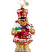One smart cookie, this special guest arrives with a sugary gum drop and striped candy cane, all in mouth-blown, hand-painted glass from Christopher Radko. A sweet gift!