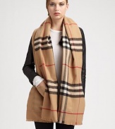 Keep your hands and neck warm in this classic design with patch pockets. Extra fine wool About 19¾ X 74¾ Dry clean Imported 